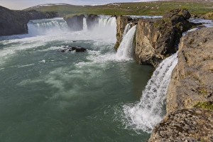 One of Icelands most spectacular waterfalls, Godafoss (Waterfall of the Gods), outside Akureyri, Iceland, Polar Regions One of Icelands most spectacular waterfalls, Godafoss (Waterfall of the Gods), outside Akureyri, Iceland, Polar Regions