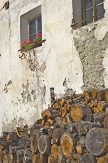 Old Stone Wall Europe Prints: Kindling and geraniums against an old wall