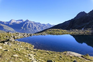 Lake Bergsee at sunrise, Chiavenna Valley, Spluga Valley, Spluga Pass, province of Sondrio Lake Bergsee at sunrise, Chiavenna Valley, Spluga Valley, Spluga Pass, province of Sondrio