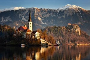 Lake Bled at dawn with Santa Maria Church (Church of Assumption), Gorenjska, Julian Alps Lake Bled at dawn with Santa Maria Church (Church of Assumption), Gorenjska, Julian Alps