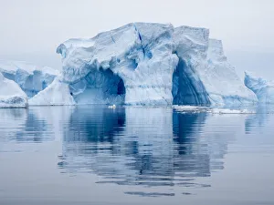 Large iceberg grounded on a reef at Peter I Island, Bellingshausen Sea, Antarctica, Polar Regions Large iceberg grounded on a reef at Peter I Island, Bellingshausen Sea, Antarctica, Polar Regions