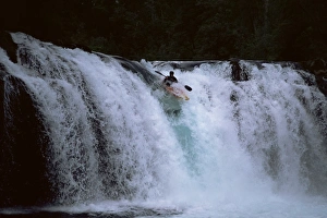 Leona Falls and kayaker, Neltume, Chile, South American Leona Falls and kayaker, Neltume, Chile, South American