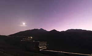Lights of car traces at dusk, Spluga Pass, Chiavenna Valley, Switzerland, Europe Lights of car traces at dusk, Spluga Pass, Chiavenna Valley, Switzerland, Europe