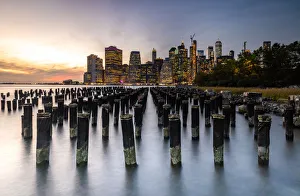 Long exposure of the lights of Lower Manhattan during sunset as seen from Brooklyn Bridge Long exposure of the lights of Lower Manhattan during sunset as seen from Brooklyn Bridge