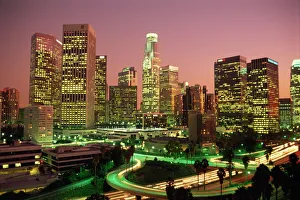 Los Angeles skyline and freeways, illuminated at night, California, United States of America Los Angeles skyline and freeways, illuminated at night, California, United States of America