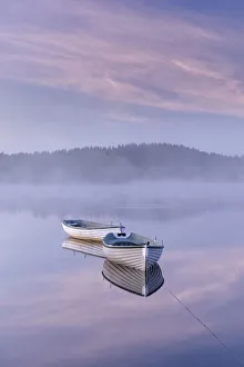 Misty daybreak over Loch Rusky in May, Aberfoyle, The Trossachs, Scotland, United Kingdom Misty daybreak over Loch Rusky in May, Aberfoyle, The Trossachs, Scotland, United Kingdom
