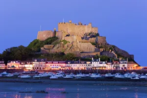 Prints of Mount Orgueil Castle, illuminated at dusk, overlooking Grouville Bay in Gorey, Jersey, Channel Islands, United Kingdom, Europe Related Prints: Mount Orgueil Castle Print: Jersey, Channel Islands at Dusk