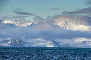 Mountain breaking through clouds Print, Elephant Island, Antarctica