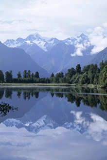 Mountains of the Southern Alps reflected in Lake Matheson Mountains of the Southern Alps reflected in Lake Matheson