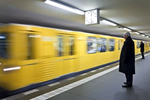 Public Transportation Germany Prints: Moving train pulling into modern subway station, Berlin, Germany, Europe