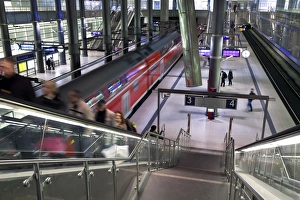Subway Stations In Europe Prints: Moving train pulling into modern train station, Berlin, Germany, Europe