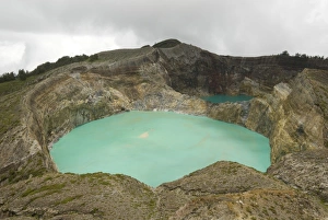 Multi-coloured crater lakes at summit of Kelimutu volcano, eastern Flores, Nusa Tenggara Multi-coloured crater lakes at summit of Kelimutu volcano, eastern Flores, Nusa Tenggara