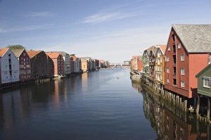 The Nidelva with merchants warehouses each side leading to the old dock area The Nidelva with merchants warehouses each side leading to the old dock area