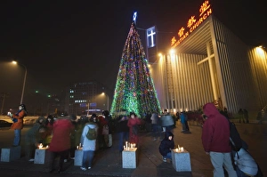 Night time illuminations of a Christmas tree and decorations at a Christian church celebrating in Beijing Night time illuminations of a Christmas tree and decorations at a Christian church celebrating in Beijing