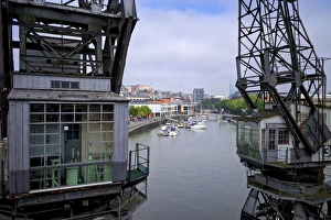 UK Cityscape Photography Prints: Old dockside cranes frame the harbour, Bristol, England, United Kingdom, Europe