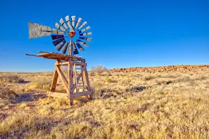 Arizona Landmarks Prints: An old windmill marking the boundary of the Devils Playground in Petrified Forest