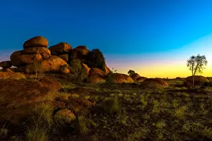 Australian Outback Scenery Prints: Outback landscape of Devils Marbles rock formations after twilight, granite boulders