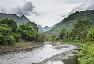 Mountain Valley Scene Prints: Paea River with dramatic mountains in the background