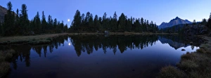 Panorama of the blue Lake Mufule lit by the moon, Malenco Valley, Province of Sondrio Panorama of the blue Lake Mufule lit by the moon, Malenco Valley, Province of Sondrio