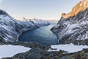 Panorama of peaks of the Ornfjorden framing the village of Fjordgard and Mount Segla in background Panorama of peaks of the Ornfjorden framing the village of Fjordgard and Mount Segla in background