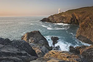 UK Coastal Scenes Prints: A peaceful dusk on Cornwalls Atlantic coast, showing the lighthouse at Trevose Head