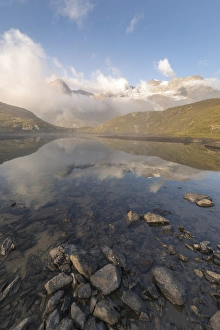 Graubunden Canton Tourism Prints: Peaks of mountain range reflected in alpine lake, Bernina Pass, Poschiavo Valley