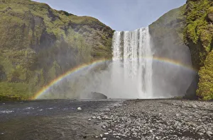 Polar Regions Travel Prints: A permanent rainbow in waterfall spray, Skogafoss Falls, near Vik, southern Iceland