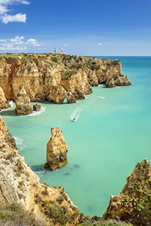 Ponta da Piedade rock formations visited by boat tours, Lagos, Algarve, Portugal, Europe Ponta da Piedade rock formations visited by boat tours, Lagos, Algarve, Portugal, Europe