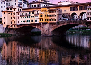 Europe's Most Famous Bridges Prints: Ponte Vecchio at sunset reflected in the River Arno, Florence, UNESCO World Heritage Site