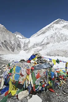 Prayer flags at the Everest Base Camp sign, Solu Khumbu Everest Region Prayer flags at the Everest Base Camp sign, Solu Khumbu Everest Region