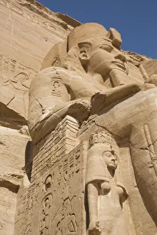 Ramses II statue with Queen Nefertari statue at lower left, Ramses II Temple Ramses II statue with Queen Nefertari statue at lower left, Ramses II Temple