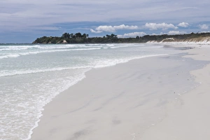 Rarawa Beach, a popular and beautiful white sand beach in Northland Region, North Island Rarawa Beach, a popular and beautiful white sand beach in Northland Region, North Island