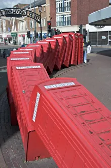 Red telephone box sculpture Out of Order by David Mach. Kingston Upon Thames Red telephone box sculpture Out of Order by David Mach. Kingston Upon Thames