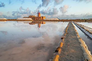 Sicily Windmill Photography Prints: Reflection of the windmill in the salt flats at dawn