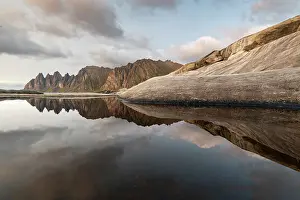 Senja Island Scenery Prints: Reflections of clouds, rocks and Devil's Teeth Mountain in evening sunlight