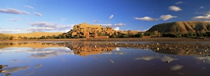 North African Village Life Prints: Reflections of kasbah in river