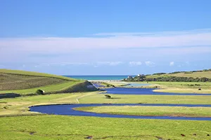 River Cuckmere meets the English Channel at Cuckmere Haven, East Sussex, South Downs National Park, England River Cuckmere meets the English Channel at Cuckmere Haven, East Sussex, South Downs National Park, England