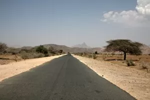 Related Images Collection: An empty road and the barren landscape of western Eritrea, Africa