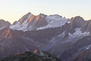 Rocky peak of Cima Presanella seen from Monte Tonale at dawn, Valcamonica, border Lombardy Rocky peak of Cima Presanella seen from Monte Tonale at dawn, Valcamonica, border Lombardy