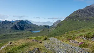 The rough road from Kilmarie to Camasunary with the towering pinnacles of Sgurr nan The rough road from Kilmarie to Camasunary with the towering pinnacles of Sgurr nan