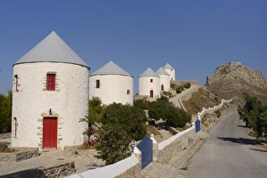 Row of old windmills on Pitiki Hill below Panteli castle, Platanos, Leros, Dodecanese Islands Row of old windmills on Pitiki Hill below Panteli castle, Platanos, Leros, Dodecanese Islands