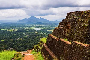 Ruins of King Kassapas Palace in front of the view from of Sigiriya Rock Fortress (Lion Rock) Ruins of King Kassapas Palace in front of the view from of Sigiriya Rock Fortress (Lion Rock)