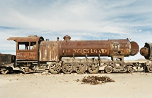 Prints of Rusting locomotive at train graveyard, Uyuni, Bolivia, South America Bolivia Prints: Rusting Locomotive Print, Uyuni Train Graveyard