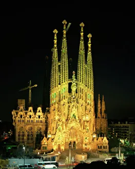 The Sagrada Familia, the Gaudi cathedral, illuminated at night in Barcelona The Sagrada Familia, the Gaudi cathedral, illuminated at night in Barcelona