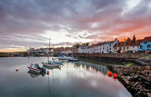 Sailing boats at sunset in the harbour at St. Monans, Fife, East Neuk, Scotland, United Kingdom Sailing boats at sunset in the harbour at St. Monans, Fife, East Neuk, Scotland, United Kingdom