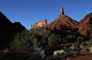 The sandstone spire of Castleton Tower dominates the Castle Valley, near the Colorado River The sandstone spire of Castleton Tower dominates the Castle Valley, near the Colorado River