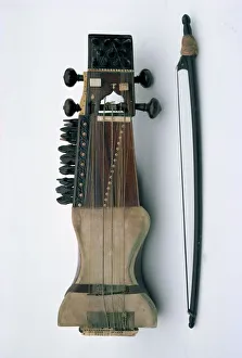 Sarangi, a traditional classical bowed instrument Sarangi, a traditional classical bowed instrument