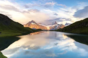 Schreckhorn mountain and Bachalpsee lake at sunset, Grindelwald, Bernese Oberland Schreckhorn mountain and Bachalpsee lake at sunset, Grindelwald, Bernese Oberland