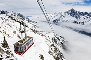 Sea of clouds weather inversion over Chamonix valley, Brevant cable car, Chamonix Sea of clouds weather inversion over Chamonix valley, Brevant cable car, Chamonix