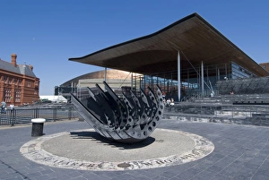 Seafarers War Memorial on the hull of a beached ship in front of the Senedd Seafarers War Memorial on the hull of a beached ship in front of the Senedd